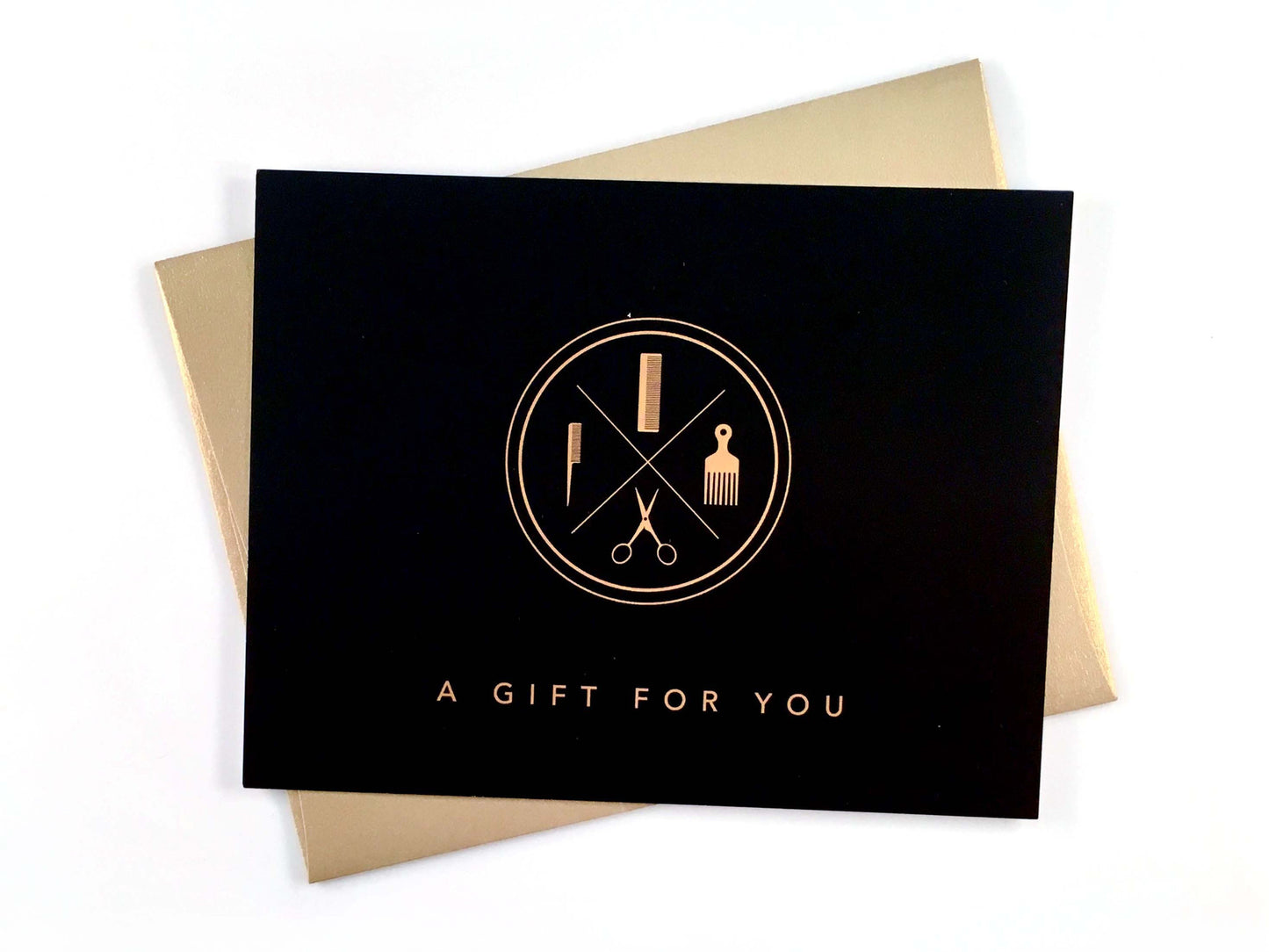 Black and gold salon gift certificate with envelope