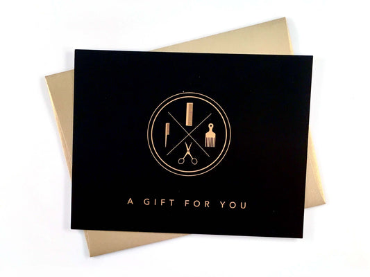 Black and gold salon gift certificate with envelope