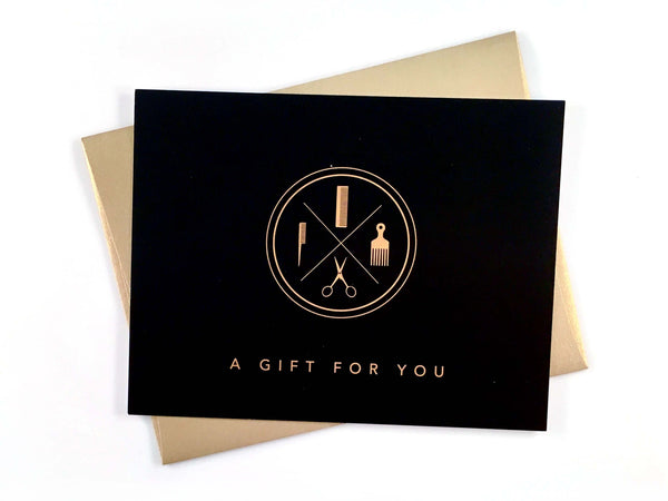Black and gold salon gift certificate with envelope
