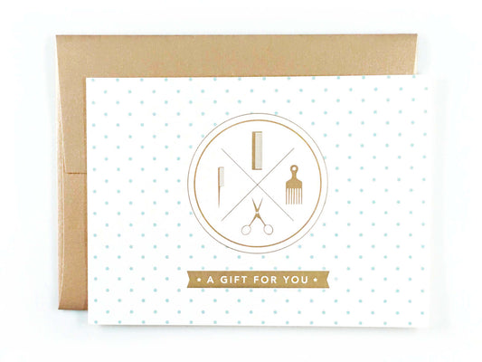 Blue polka dot salon gift certificate with gold envelope