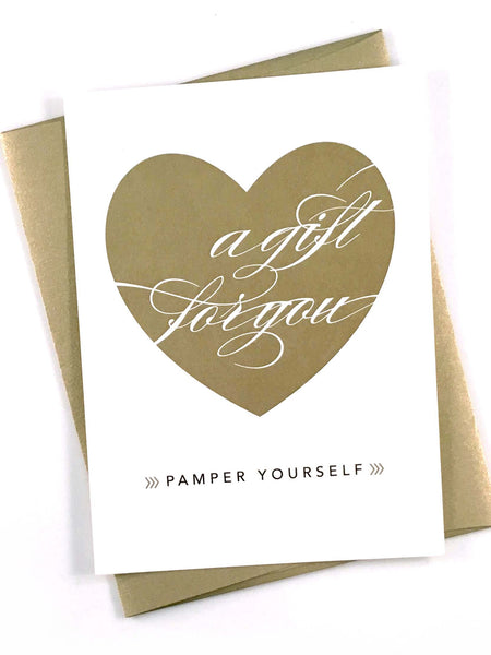 Gold heart salon gift certificate with gold envelope