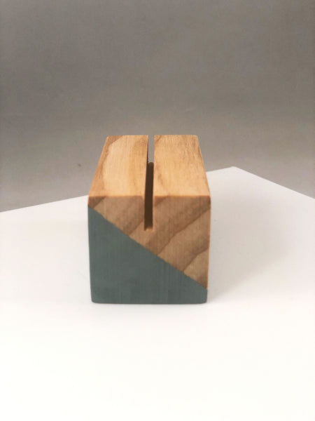 Side view of wooden block sign holder hand painted with angled light blue design
